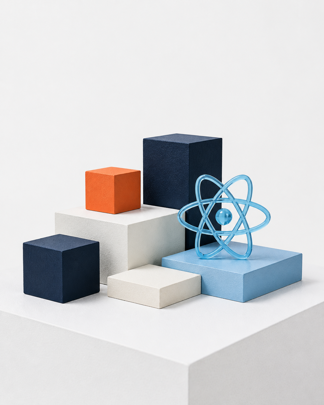 Minimal studio product display with geometric island blocks and a translucent React atom sculpture